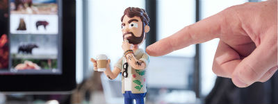 Irritante art director als Action Figure van Adobe en Achtung