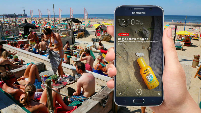Kruidvat verrast strandgast met lockscreen-reclame